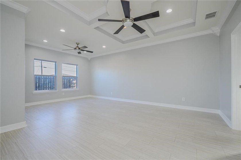 This stylishly crafted home in desirable Sea Oaks Village - photo 18