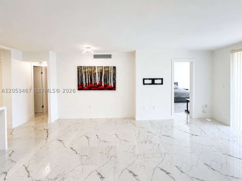 Beautifully remodeled 2-bedroom + den, 2-bath residence has the - photo 7