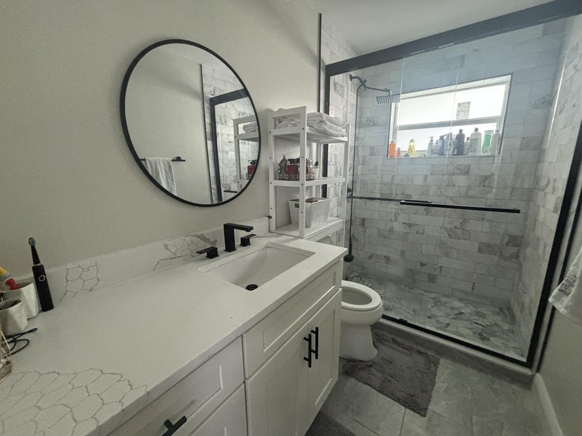 Welcome to this stunningly updated 2-bedroom, 1-bath villa! - photo 8