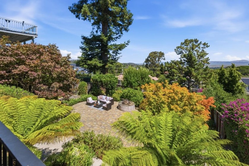 Perched on a picturesque Emerald Hills street, this beautifully - photo 13