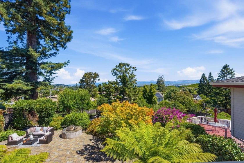 Perched on a picturesque Emerald Hills street, this beautifully - photo 15