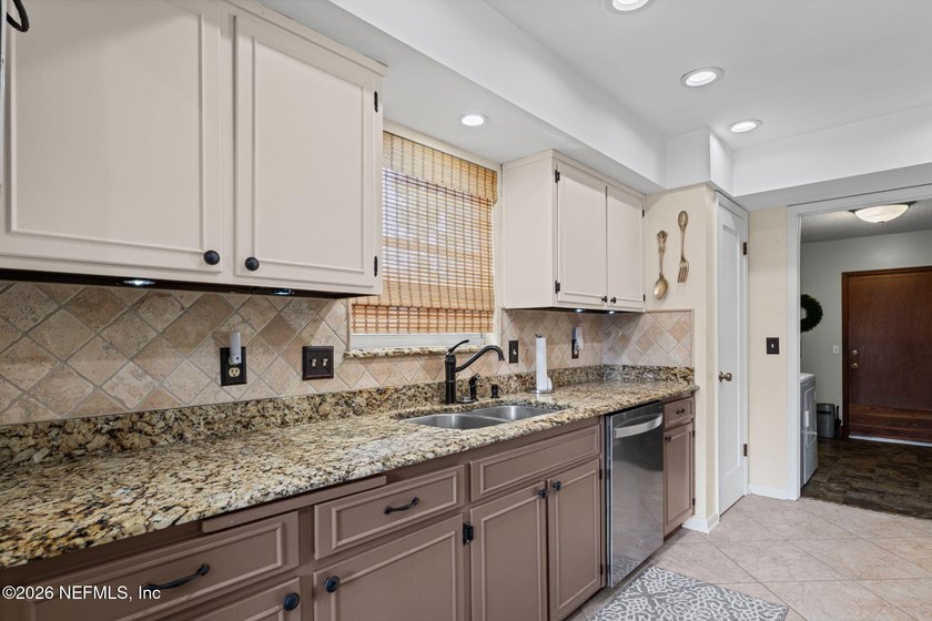 Location, location, location! This beautifully maintained brick - photo 15