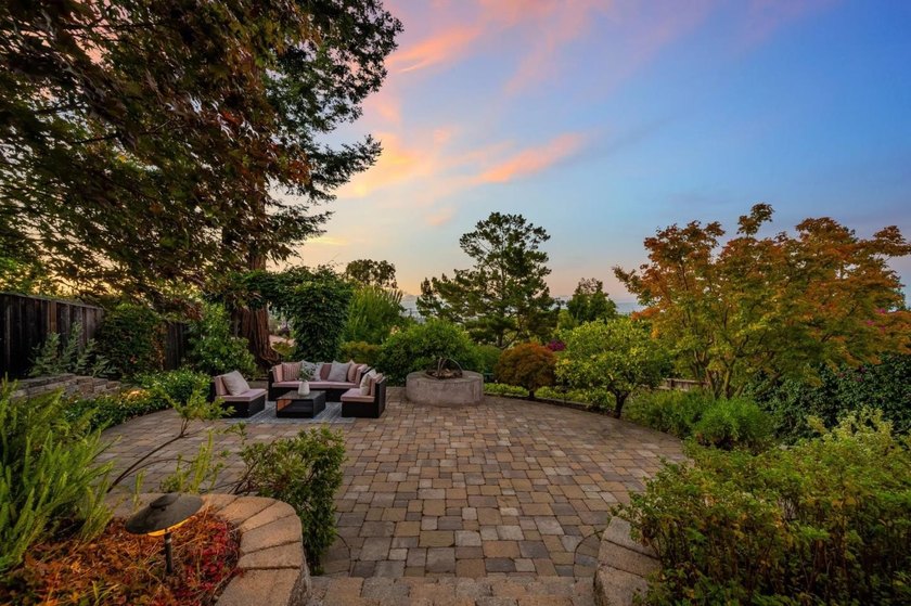 Perched on a picturesque Emerald Hills street, this beautifully - photo 17