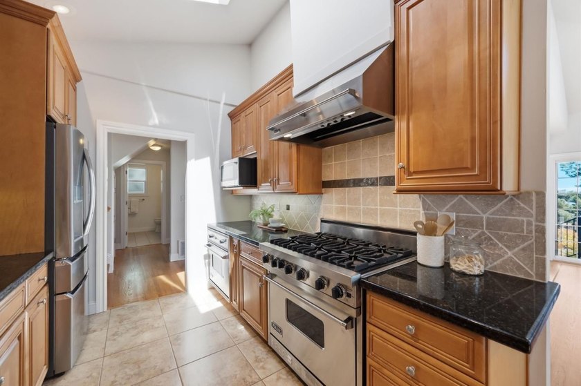 Perched on a picturesque Emerald Hills street, this beautifully - photo 29
