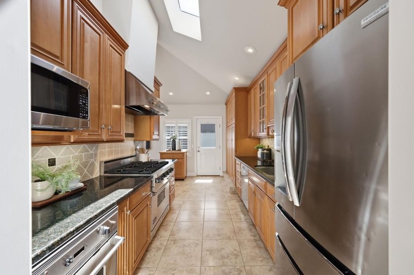 Perched on a picturesque Emerald Hills street, this beautifully - photo 30