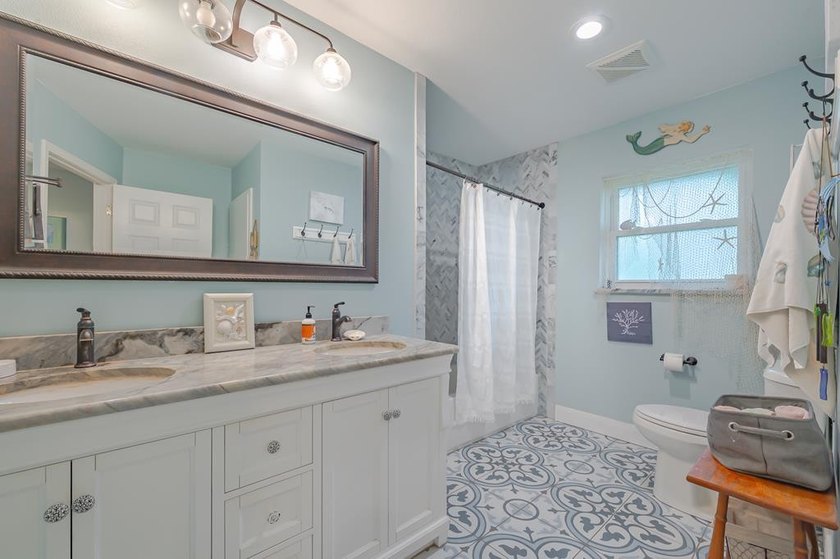 Welcome to this beautifully updated coastal rambler, where - photo 50