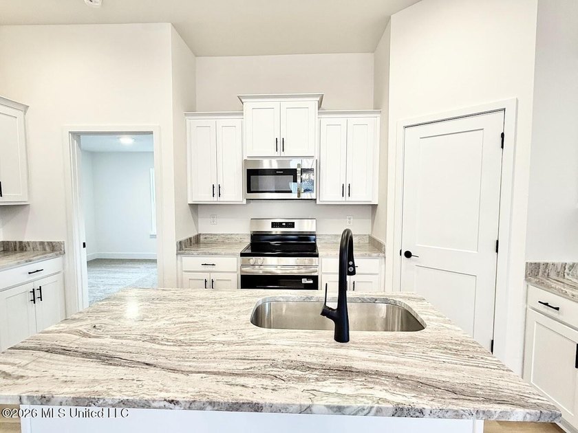 Step into comfort and style with this thoughtfully designed home - photo 7