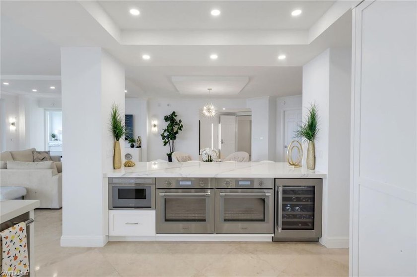 Sweeping Gulf and Bay views set the stage for this beautifully - photo 12