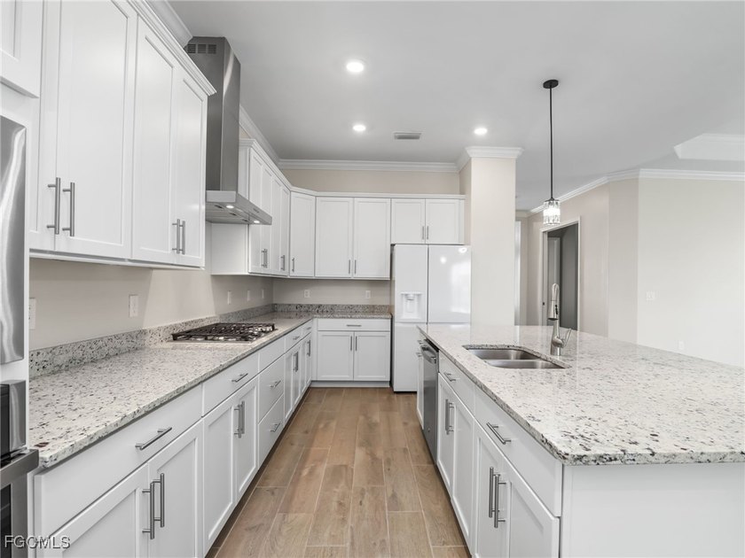 Live where others vacation in this Calusa model, overlooking the - photo 11