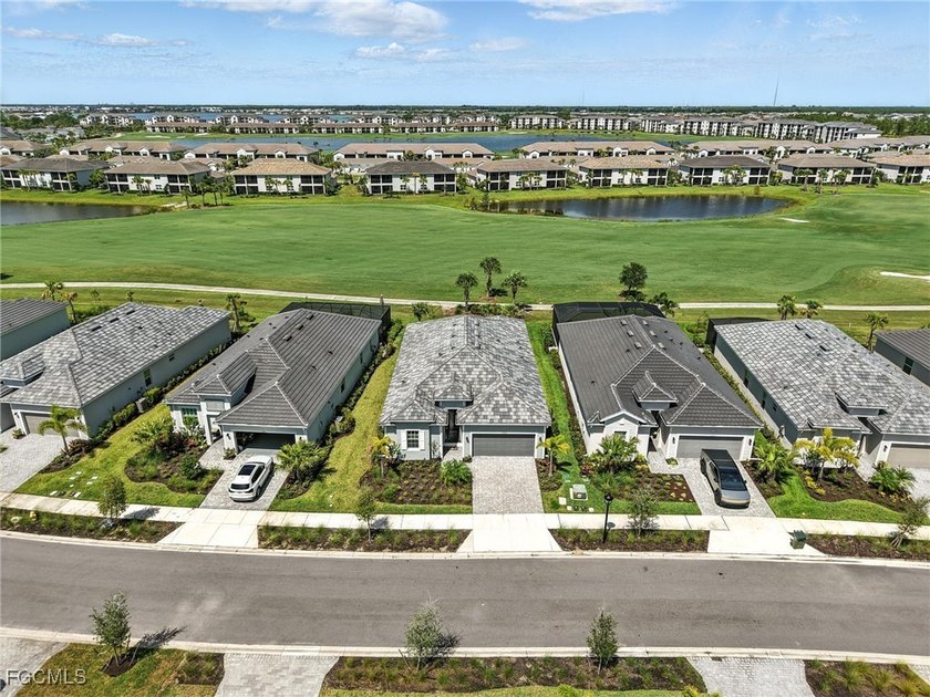Live where others vacation in this Calusa model, overlooking the - photo 31