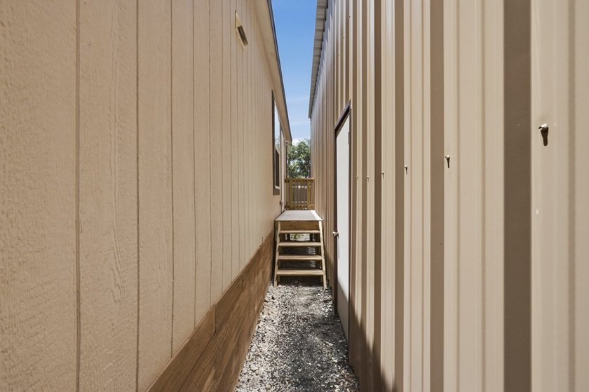 *HOME *DOUBLE LOT *FENCED *BOAT BARN Nestled beneath a canopy of - photo 23