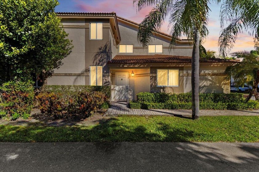 Behind the gates of Boca Pointe, this 3BR/3BA corner townhome - photo 3
