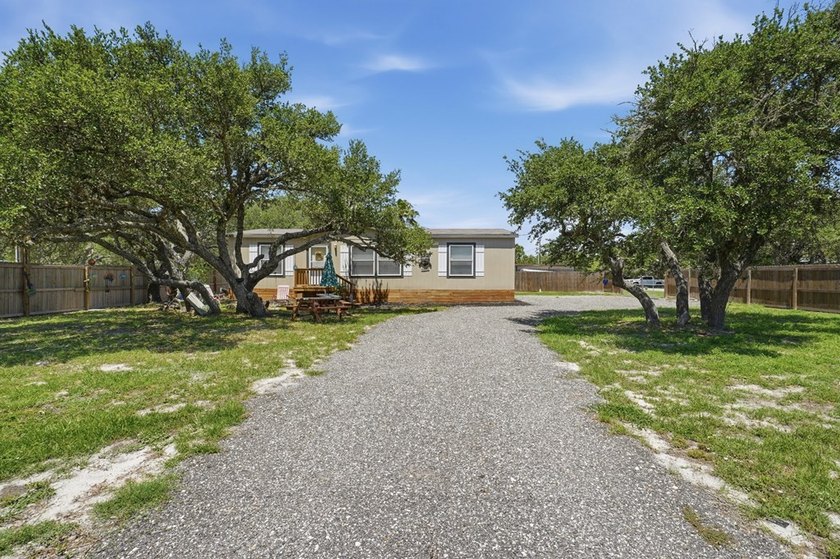 *HOME *DOUBLE LOT *FENCED *BOAT BARN Nestled beneath a canopy of - photo 24