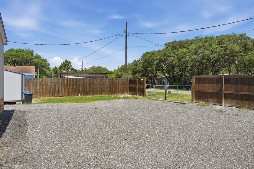 *HOME *DOUBLE LOT *FENCED *BOAT BARN Nestled beneath a canopy of - photo 28