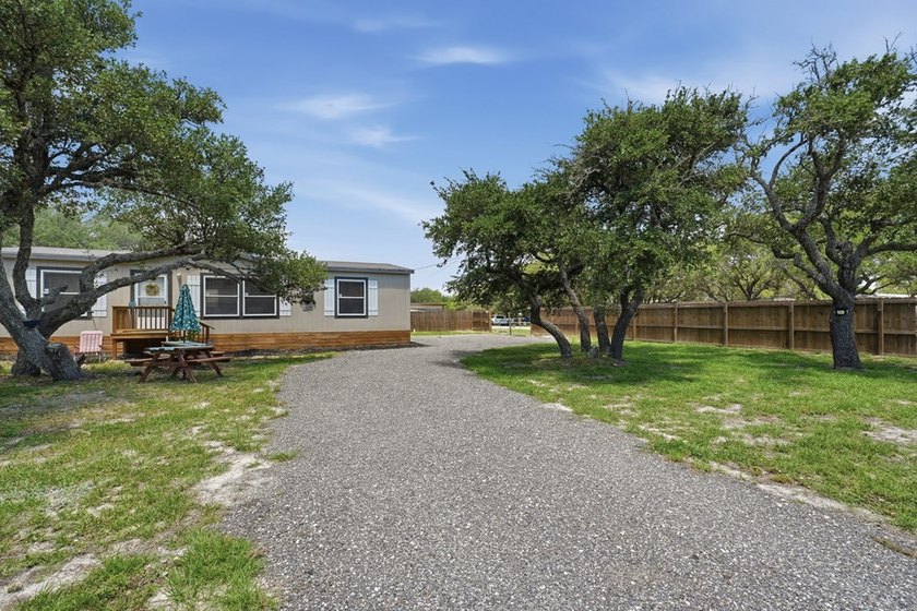 *HOME *DOUBLE LOT *FENCED *BOAT BARN Nestled beneath a canopy of - photo 30