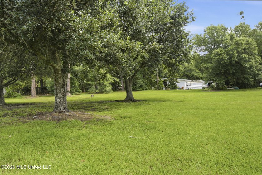 Welcome to one of Bayou View's rarest opportunities! Situated on - photo 36