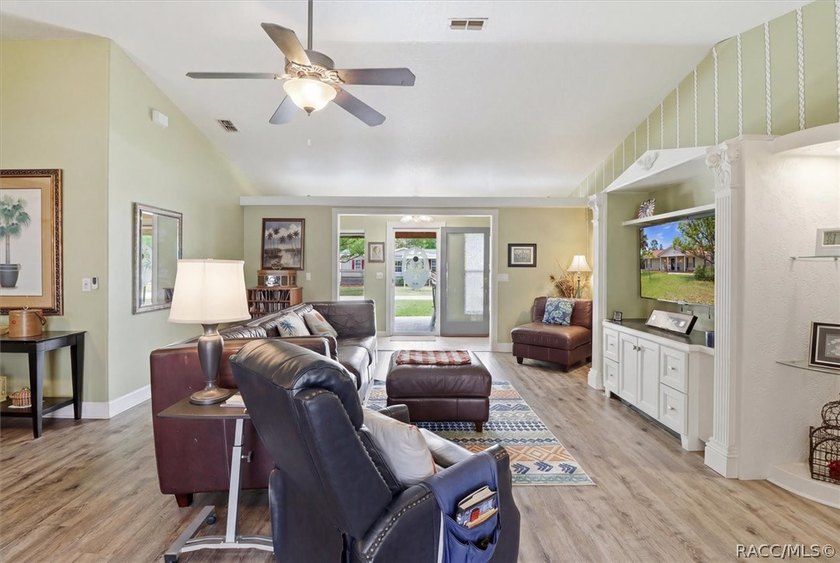 Welcome home to this inviting three-bedroom, two-bath with - photo 12