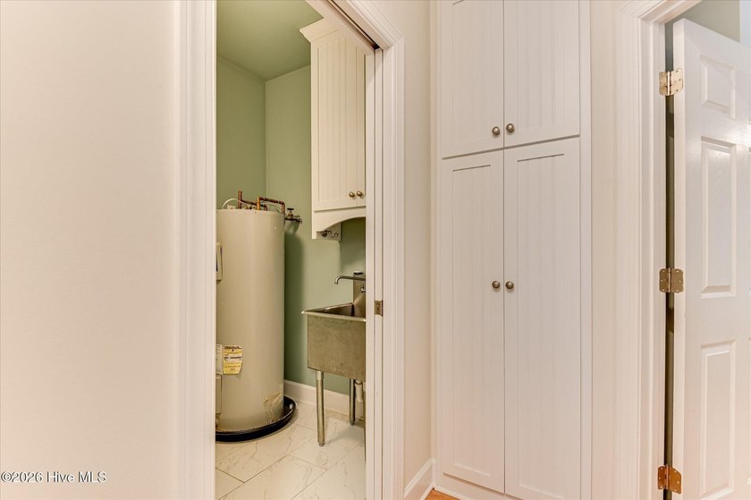 **This stunning brick home truly has it all.** Nestled in one of - photo 21