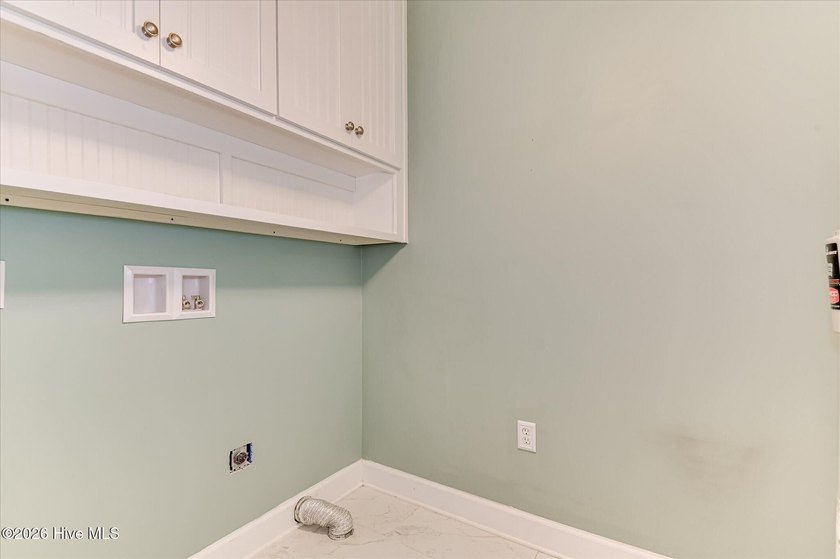 **This stunning brick home truly has it all.** Nestled in one of - photo 22