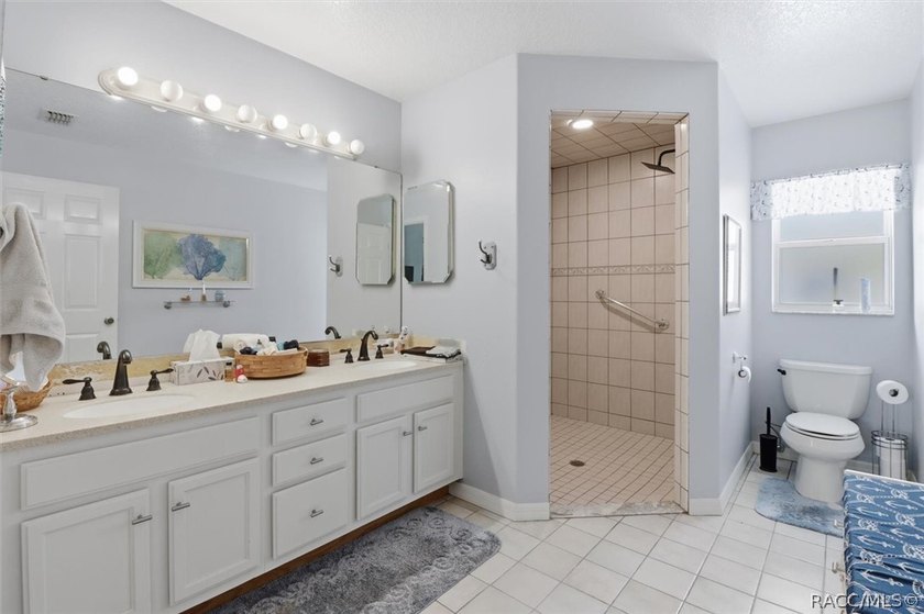 Welcome home to this inviting three-bedroom, two-bath with - photo 23