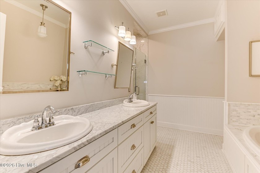 **This stunning brick home truly has it all.** Nestled in one of - photo 27