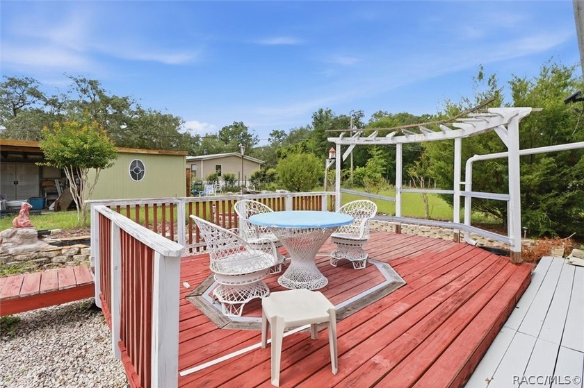 Welcome home to this inviting three-bedroom, two-bath with - photo 33