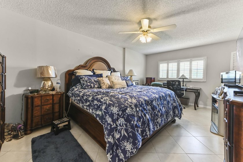 Welcome to this charming 2-bedroom, 2-bathroom condominium - photo 10