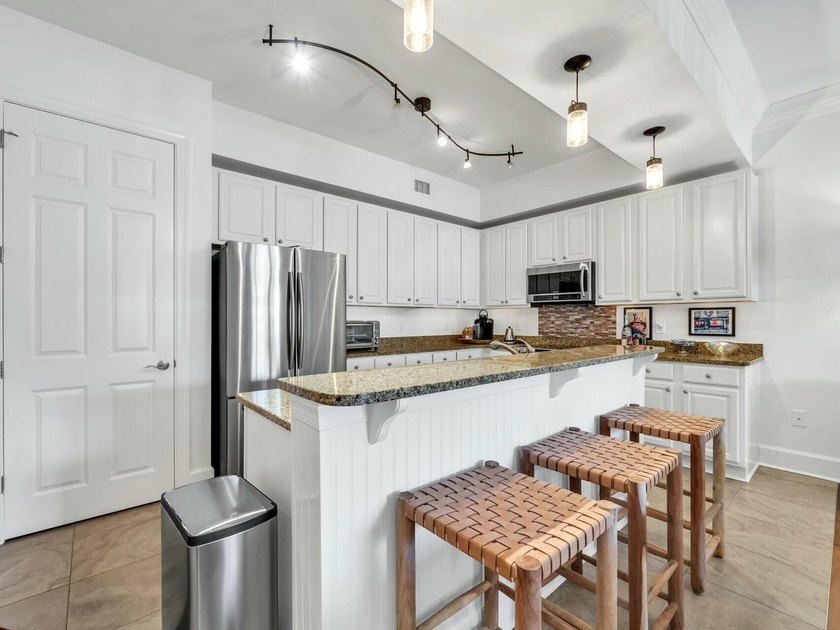 Tucked away in the exclusive gated community of Sanctuary at - photo 22