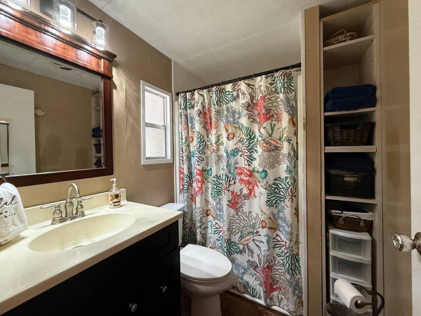 Welcome to this beautifully updated waterfront home located - photo 22