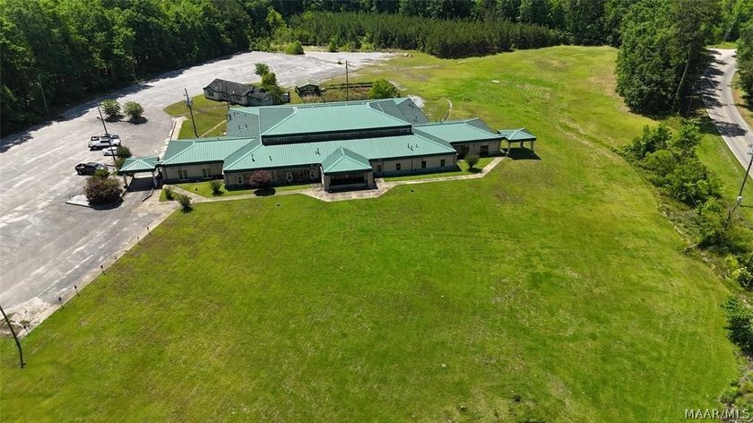 Nestled on 11.62 scenic acres with a tranquil pond at the front - photo 33
