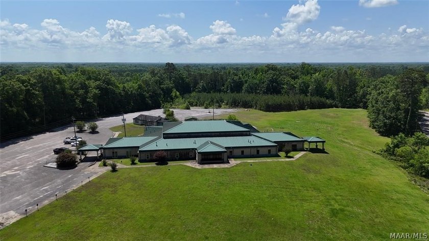 Nestled on 11.62 scenic acres with a tranquil pond at the front - photo 34
