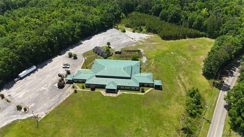 Nestled on 11.62 scenic acres with a tranquil pond at the front - photo 35