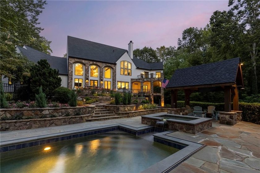 Beautifully updated, this one-of-a-kind property features a - photo 5