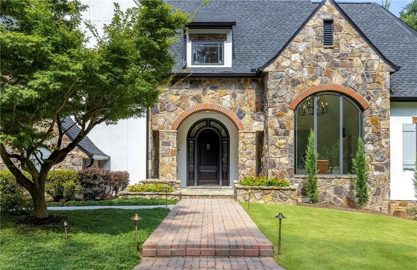 Beautifully updated, this one-of-a-kind property features a - photo 6