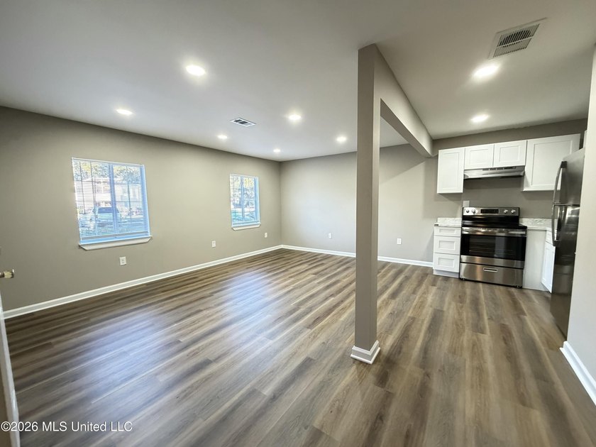 Completely renovated and move-in ready, this charming 2-bedroom - photo 3