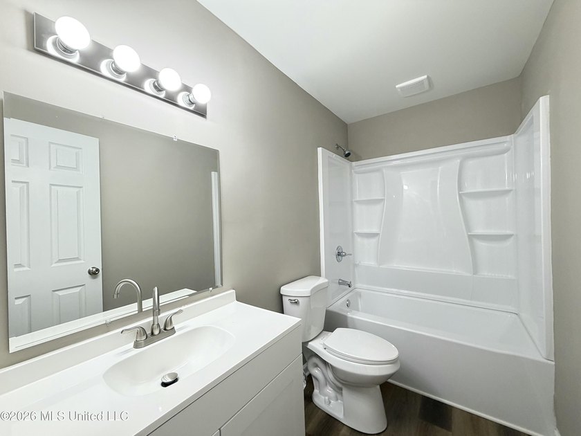 Completely renovated and move-in ready, this charming 2-bedroom - photo 8