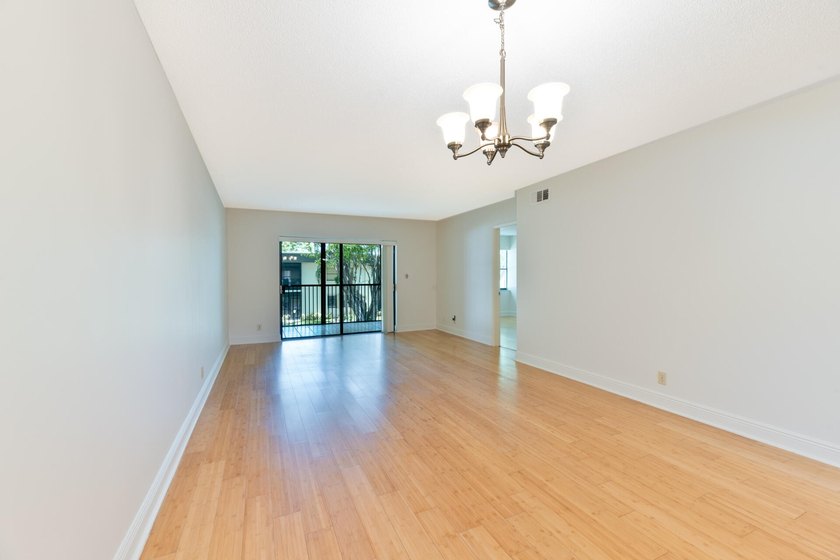 WELCOME TO THIS AMAZING MAINTAINED 2 BR, BATH CONDO IN DESIRABLE - photo 4