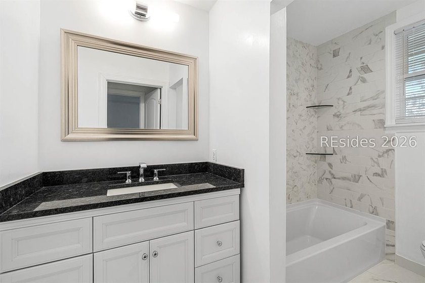 Welcome to your newly renovated haven in the highly sought-after - photo 26