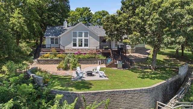 Perched high on the bluff overlooking the waters of Lake Hudson - photo 36
