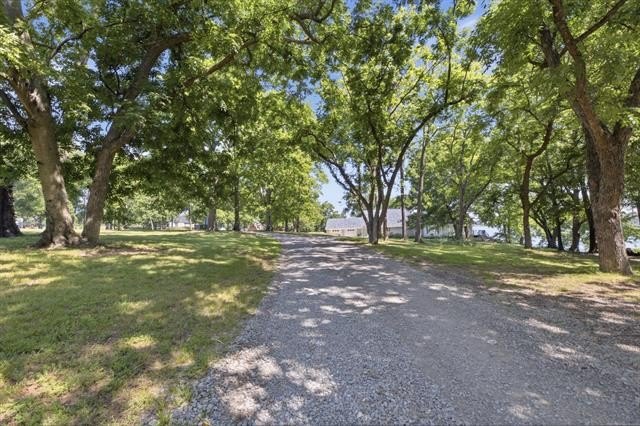 Perched high on the bluff overlooking the waters of Lake Hudson - photo 44