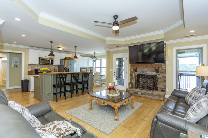 Experience lake living at its finest on year-round water on the - photo 9