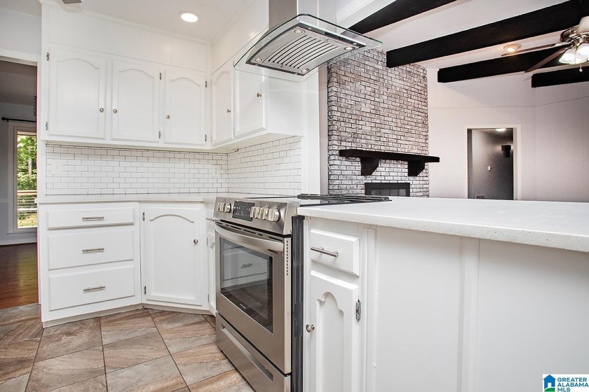 Completely renovated and move-in ready, this light-filled home - photo 5