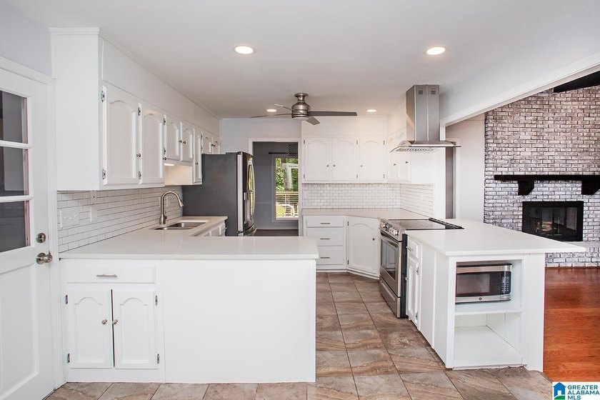 Completely renovated and move-in ready, this light-filled home - photo 7