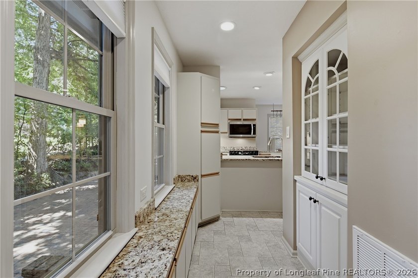 ONE OF A KIND! Nestled on nearly two acres in the heart of - photo 14