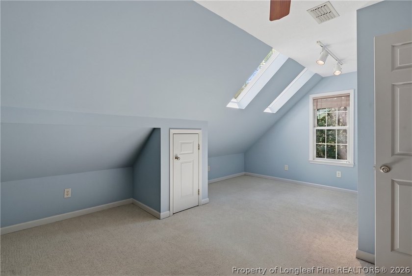 ONE OF A KIND! Nestled on nearly two acres in the heart of - photo 23