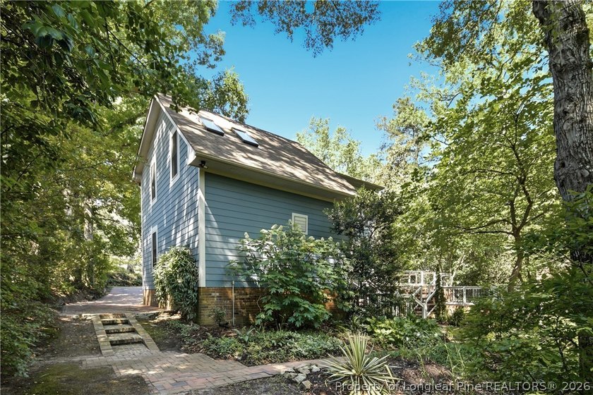 ONE OF A KIND! Nestled on nearly two acres in the heart of - photo 39