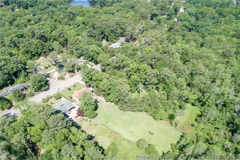 ONE OF A KIND! Nestled on nearly two acres in the heart of - photo 49