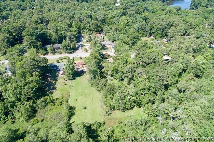 ONE OF A KIND! Nestled on nearly two acres in the heart of - photo 50