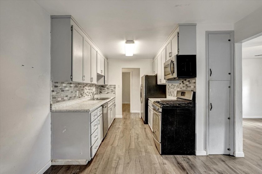 This 3-bedroom, 2-bath home offers 1,215 square feet of - photo 11