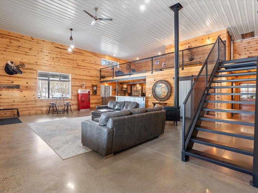 County Home on 12.54 Acres! This versatile property offers - photo 11